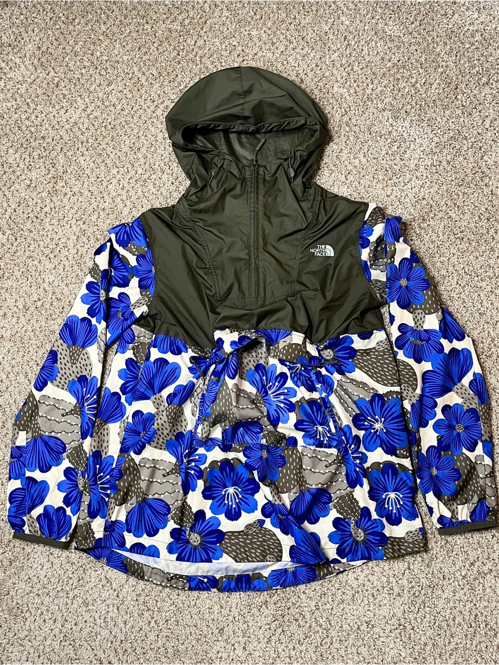 The North Face Olive Hooded Raincoat with Blue Floral Print